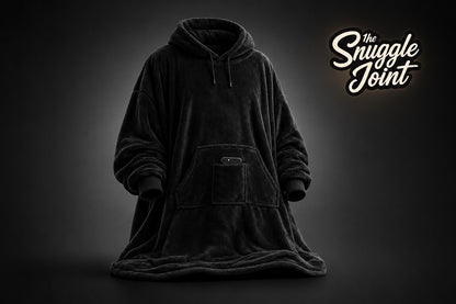 The Snuggle Joint Black Blanket Hoody – Ultra-soft oversized wearable blanket hoodie with a hood and front pocket, perfect for staying warm during winter in South Africa.